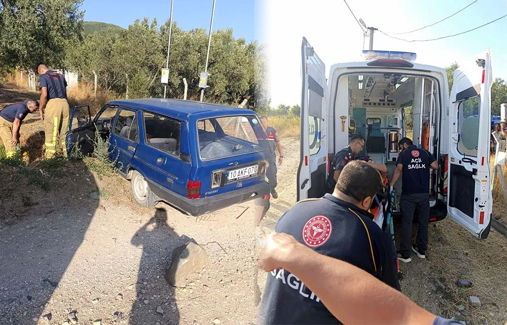 Erdek’te tek taraflı trafik kazası: Yan yatan araçta sıkışan sürücü kurtarıldı